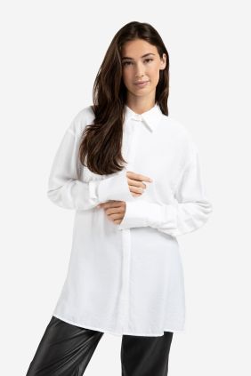 Blusa larga con cuello y puños extraíbles