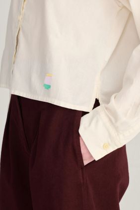 Pantalones plisados de sarga y pierna ancha