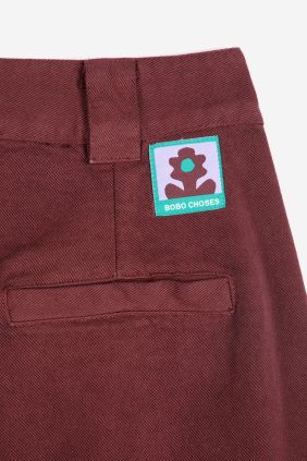 Pantalones plisados de sarga y pierna ancha